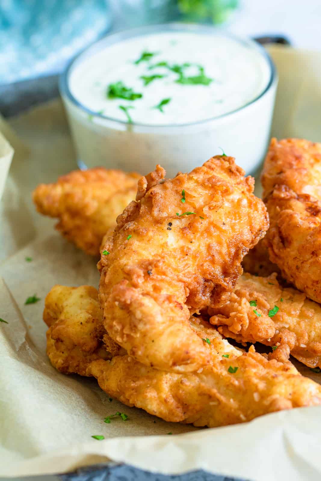 Chicken tenders on platter with dipping sauce
