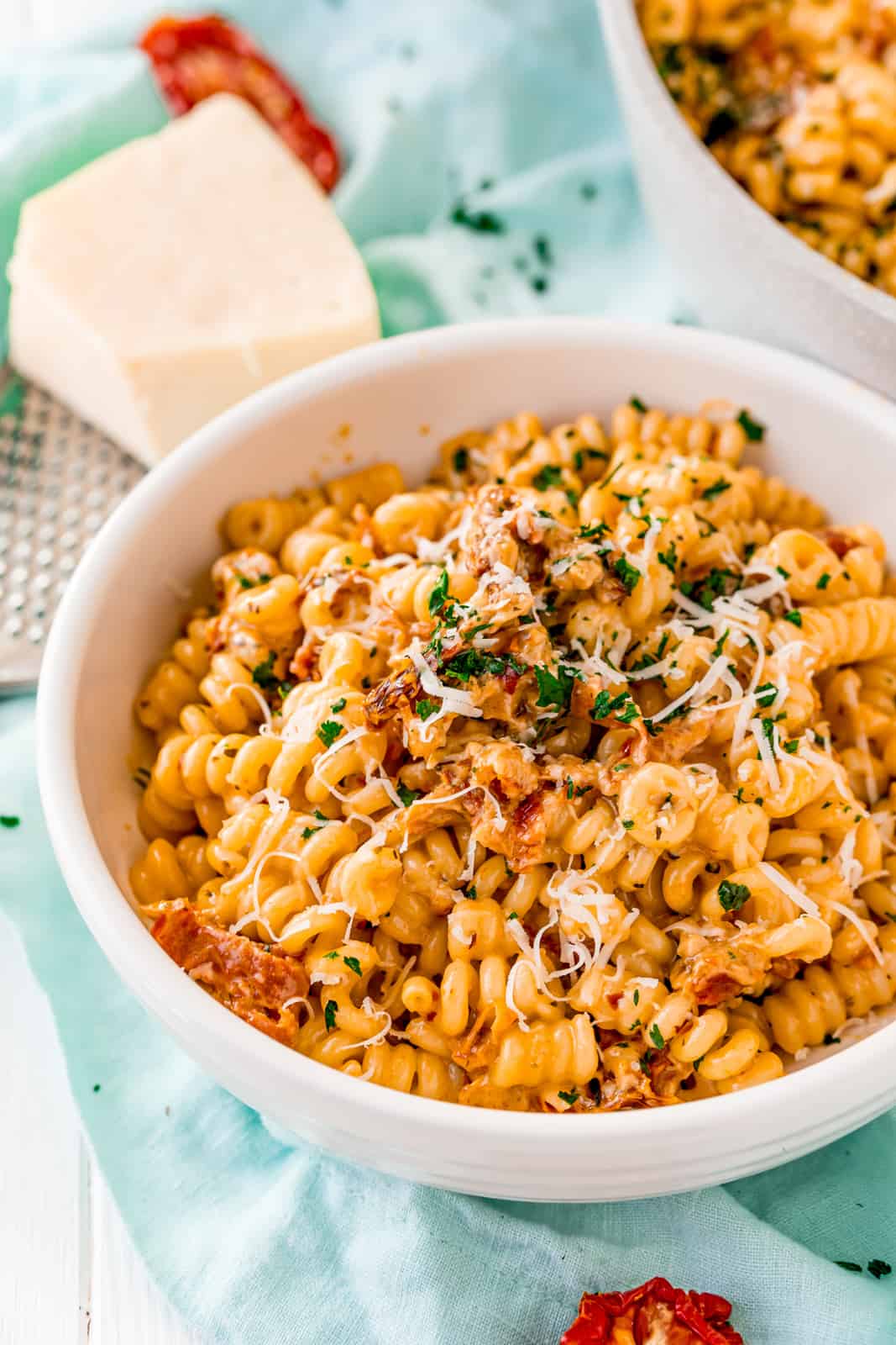 White bowl filled with Sun-Dried Tomato Pasta