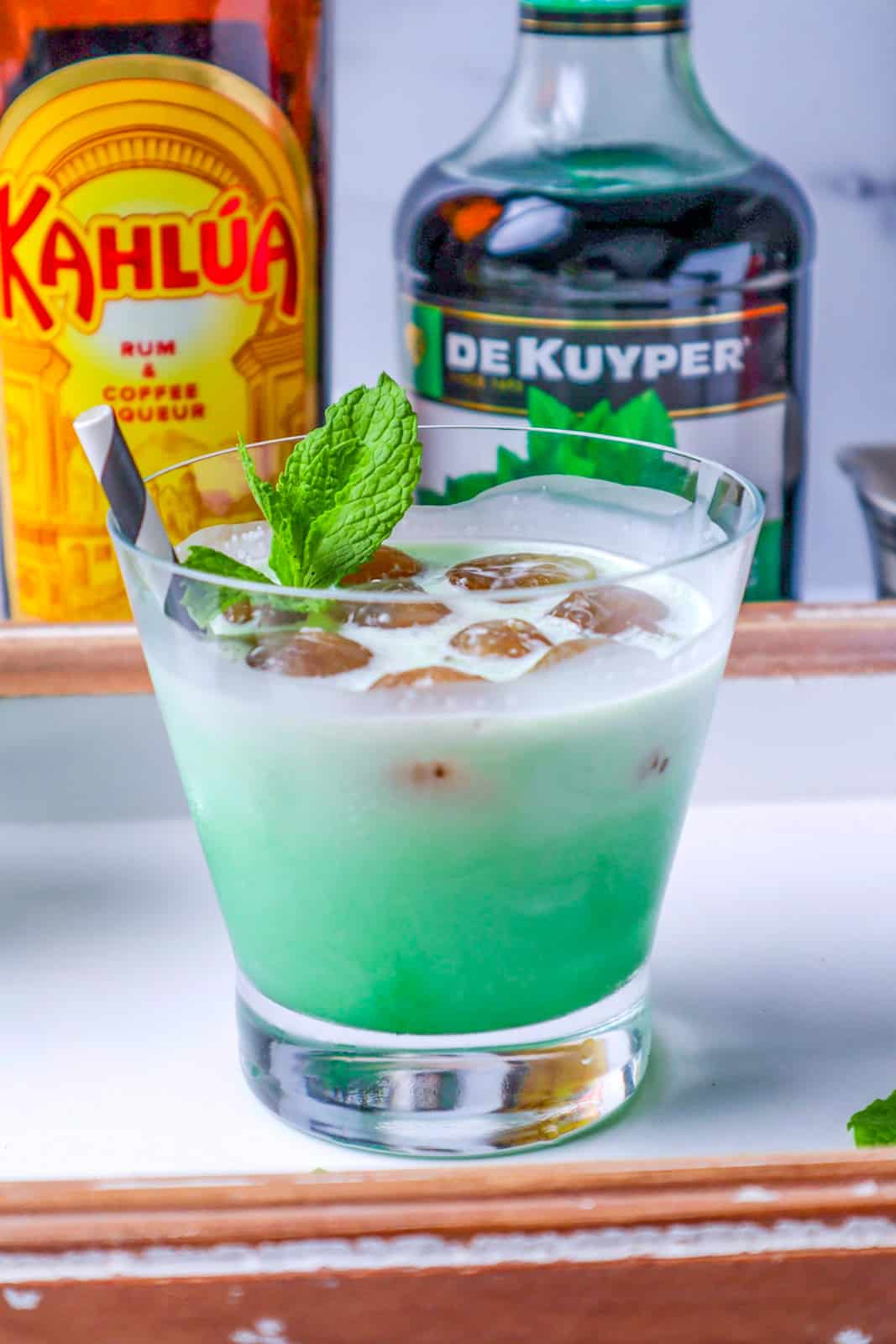 One Glass of a Thin Mint White Russian Recipe garnished with a mint leaf
