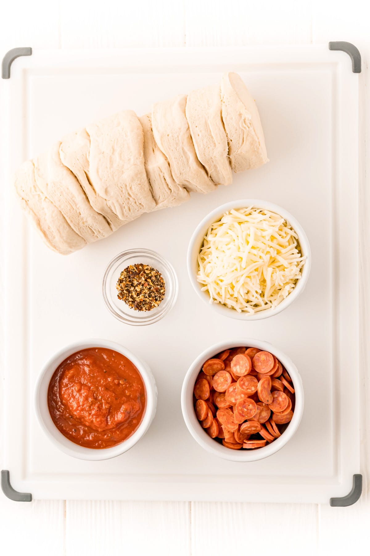 Ingredients needed to make a Mini Air Fryer Pizza recipe.