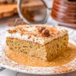 Close up of Kahlua Tres Leches Cake on white plate square image