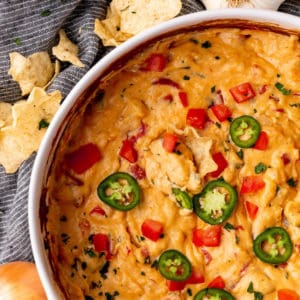Close up overhead image of Baked Queso Dip with chip