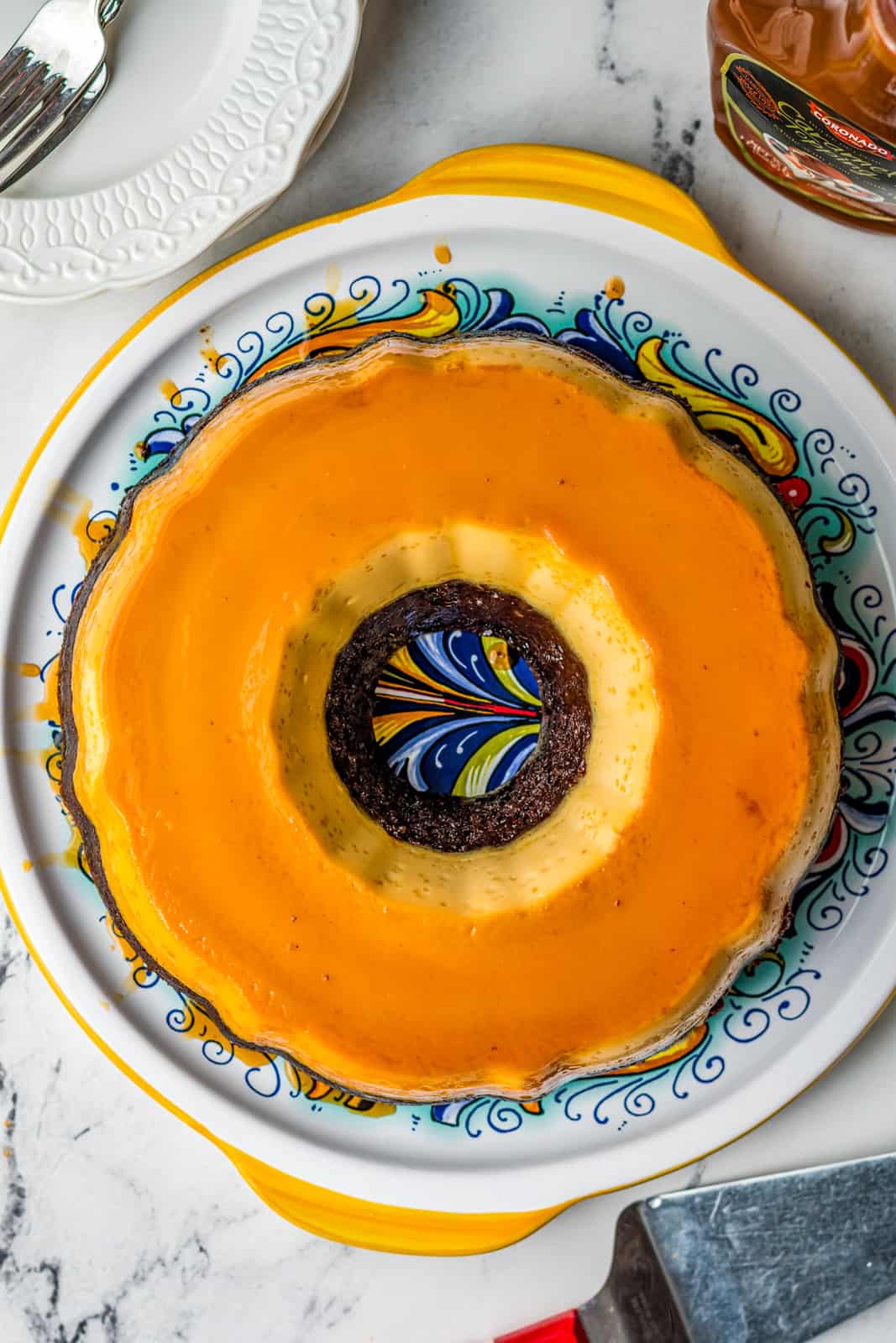 Finished Chocoflan Recipe overhead on colorful platter