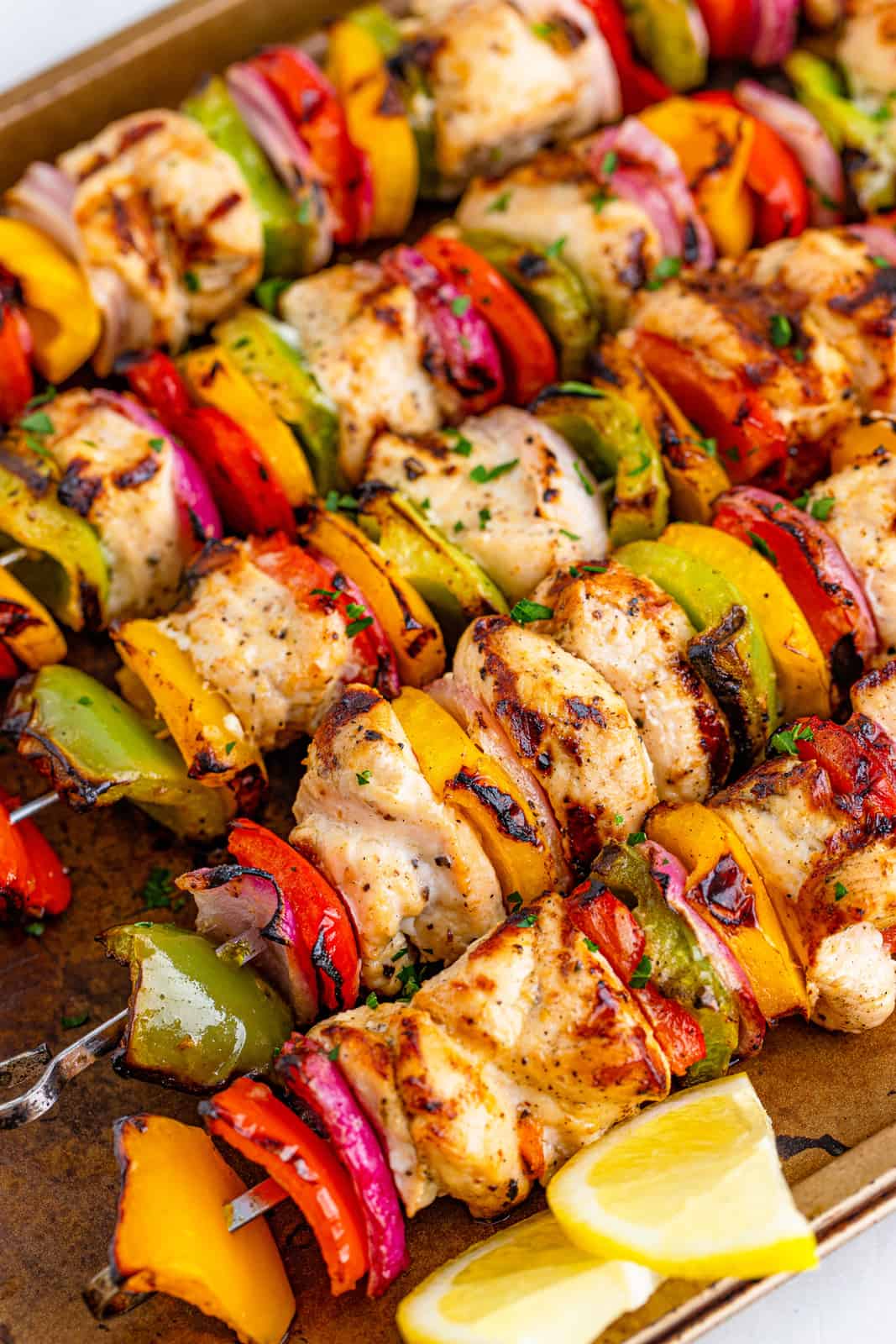 Finished Lemon Pepper Chicken Kabobs on sheet pan