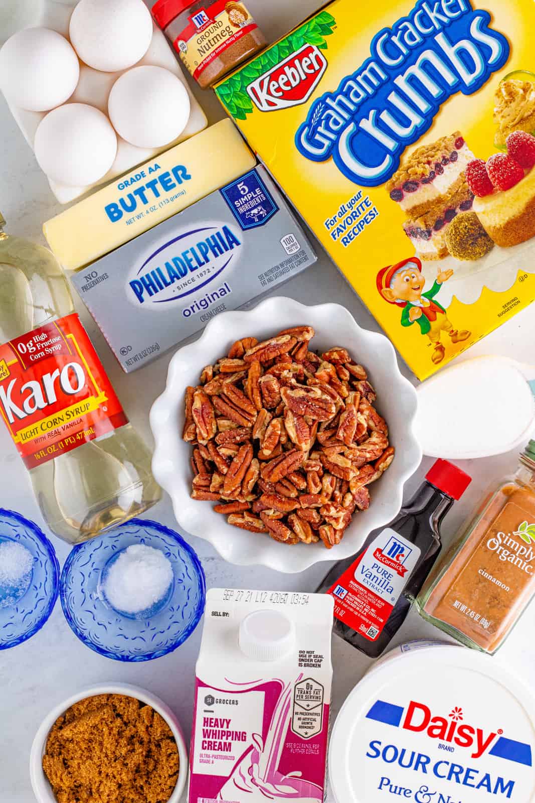 Ingredients needed to make a Pecan Pie Cheesecake.