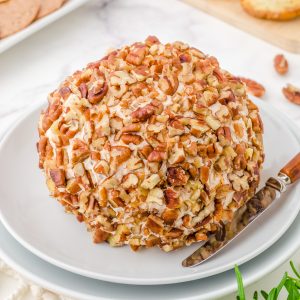 Square image of pecan covered Cheese Ball.