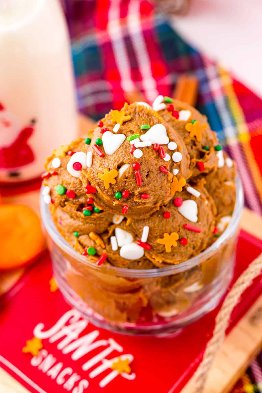 Overhead image of Edible Cookie Dough in clear dish with holiday toppings.