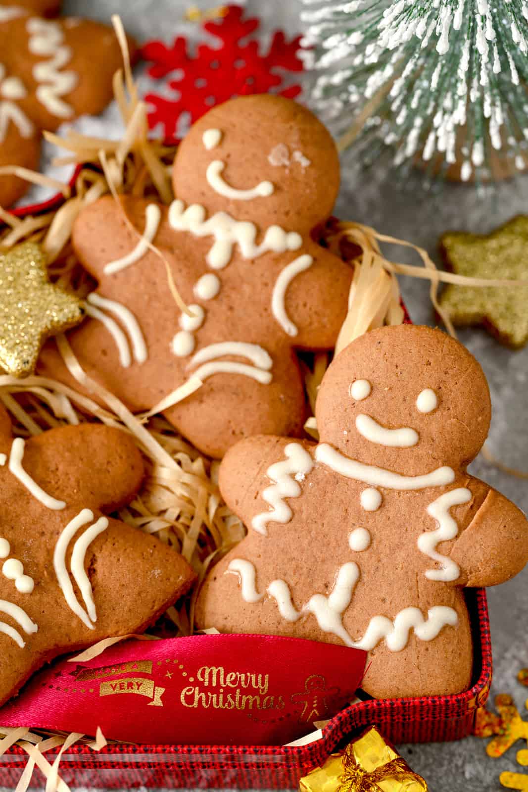 Close up of two Gingerbread Men Cookies decorated.