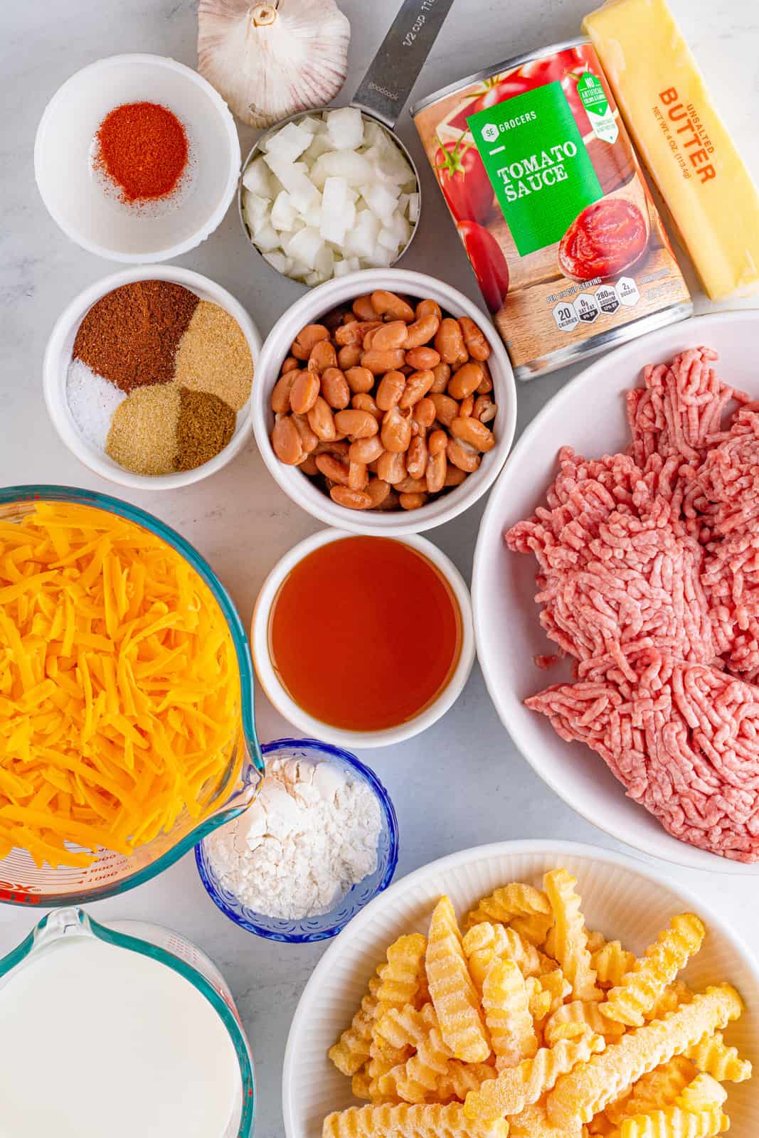 Ingredients needed to make Chili Cheese Fries.