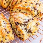 Square image of Chocolate Chip Scones on wire rack.