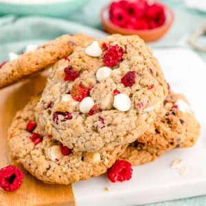 Square image of Raspberry White Chocolate Cookies piled up.