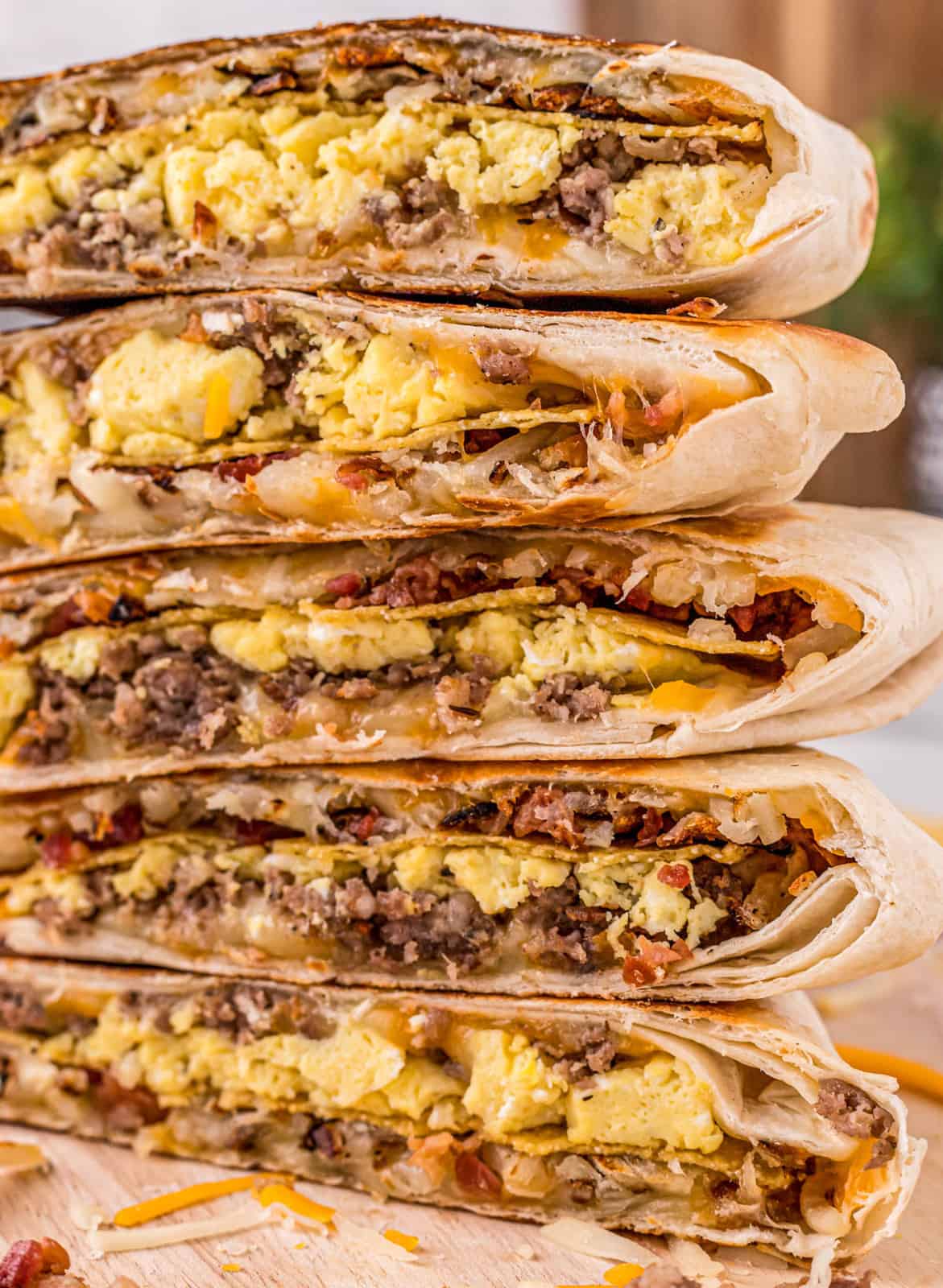 Close up side view of Breakfast Crunchwraps cut in half.