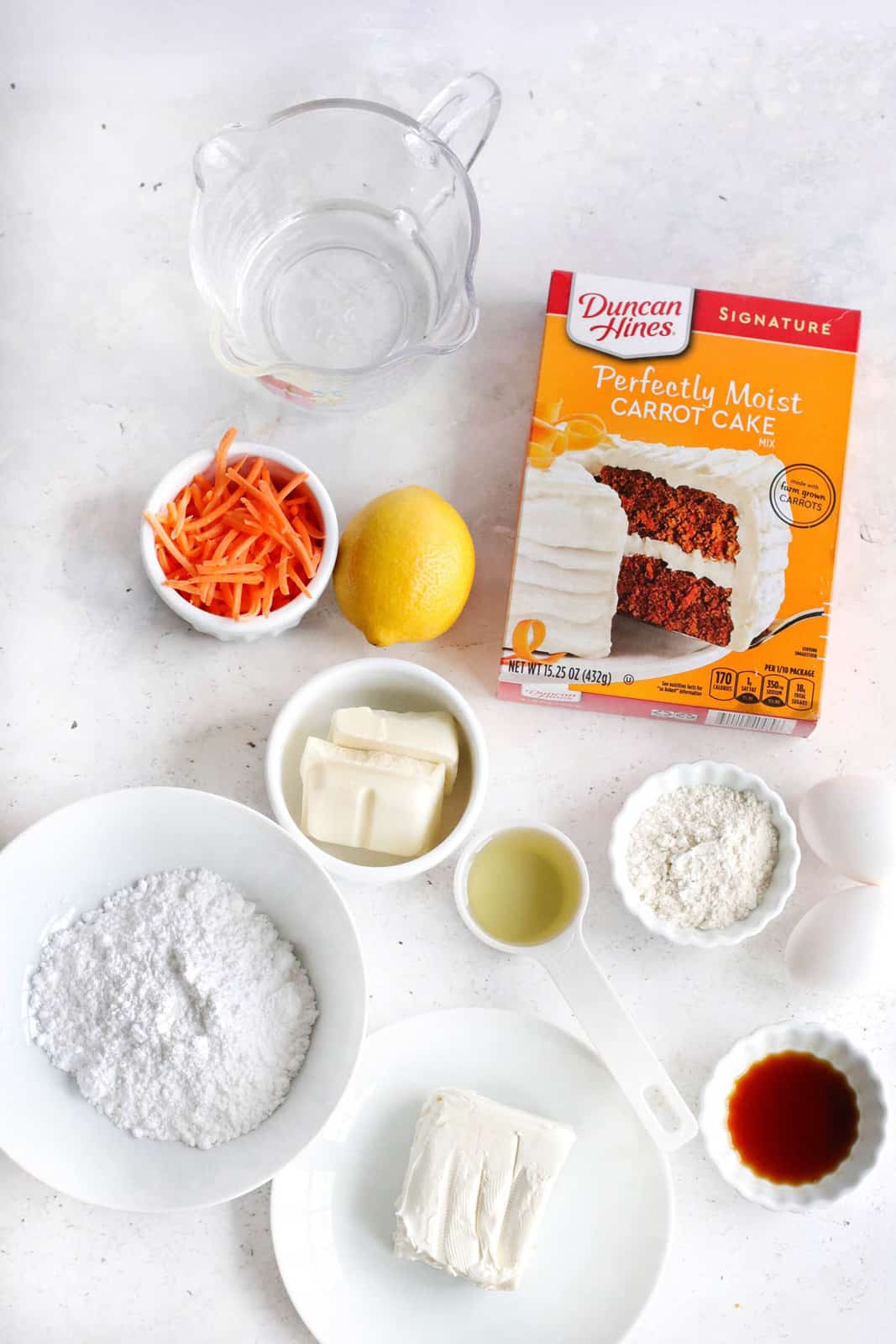 Ingredients needed to make Cream Cheese Carrot Cake Cookies.
