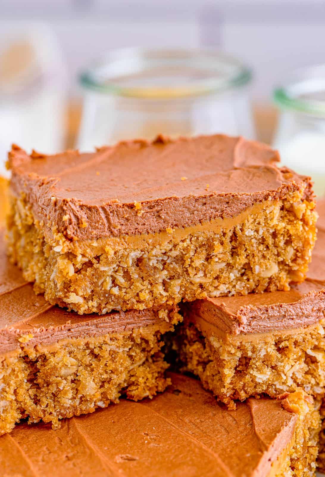 Close up of one Lunch Lady Peanut Butter Bar showing the layering.