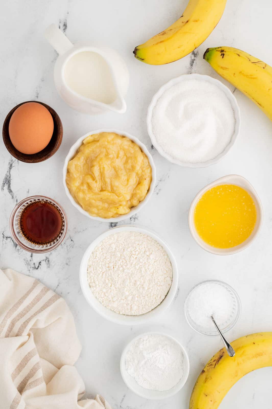 Ingredients needed to make Banana Sheet Pan Pancakes.