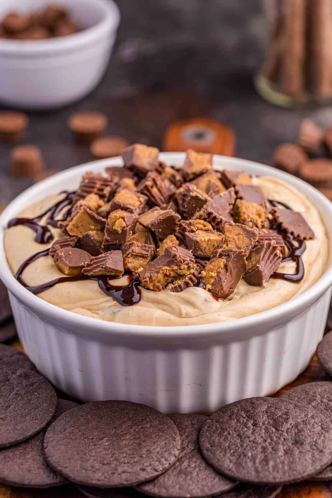 Dished up and garnished Reese's Cheesecake Dip in white bowl.