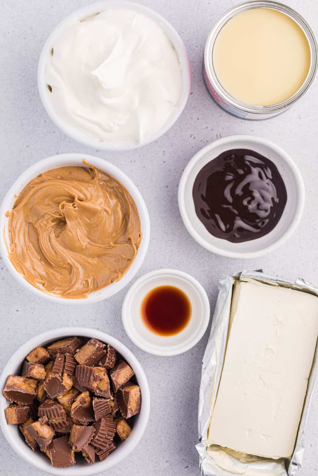Ingredients needed to make Reese's Cheesecake Dip.