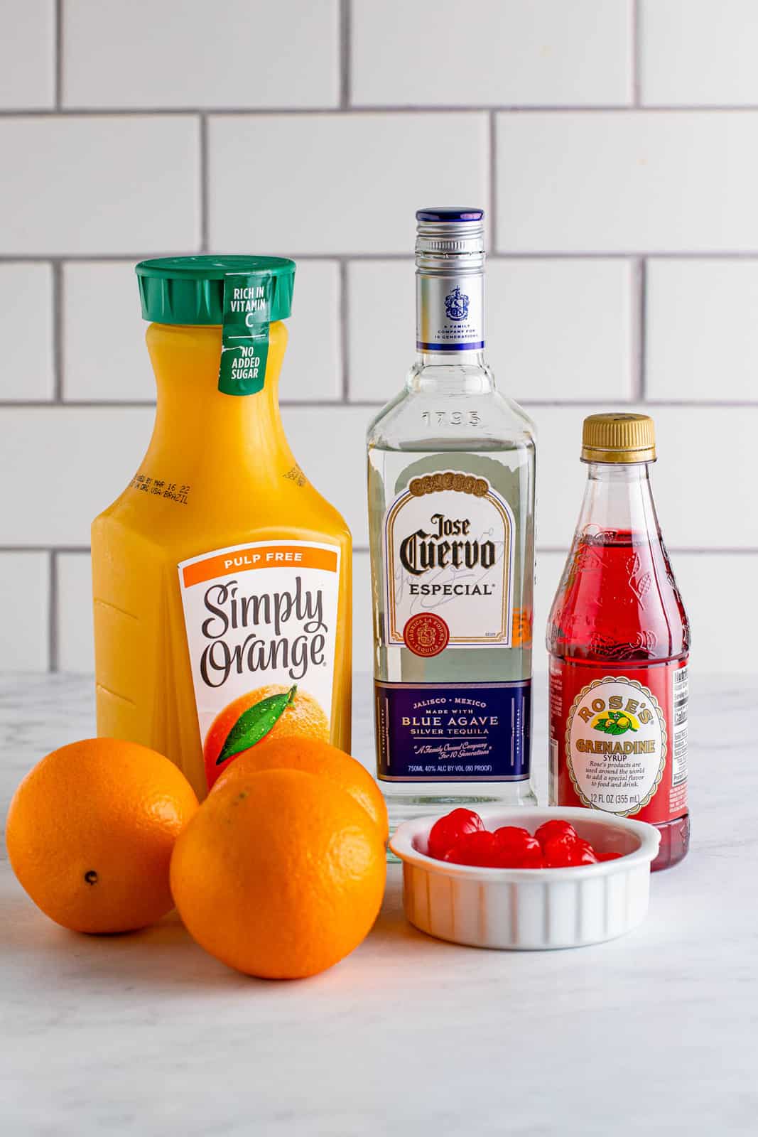 Ingredients needed to make a Tequila Sunrise Recipe.