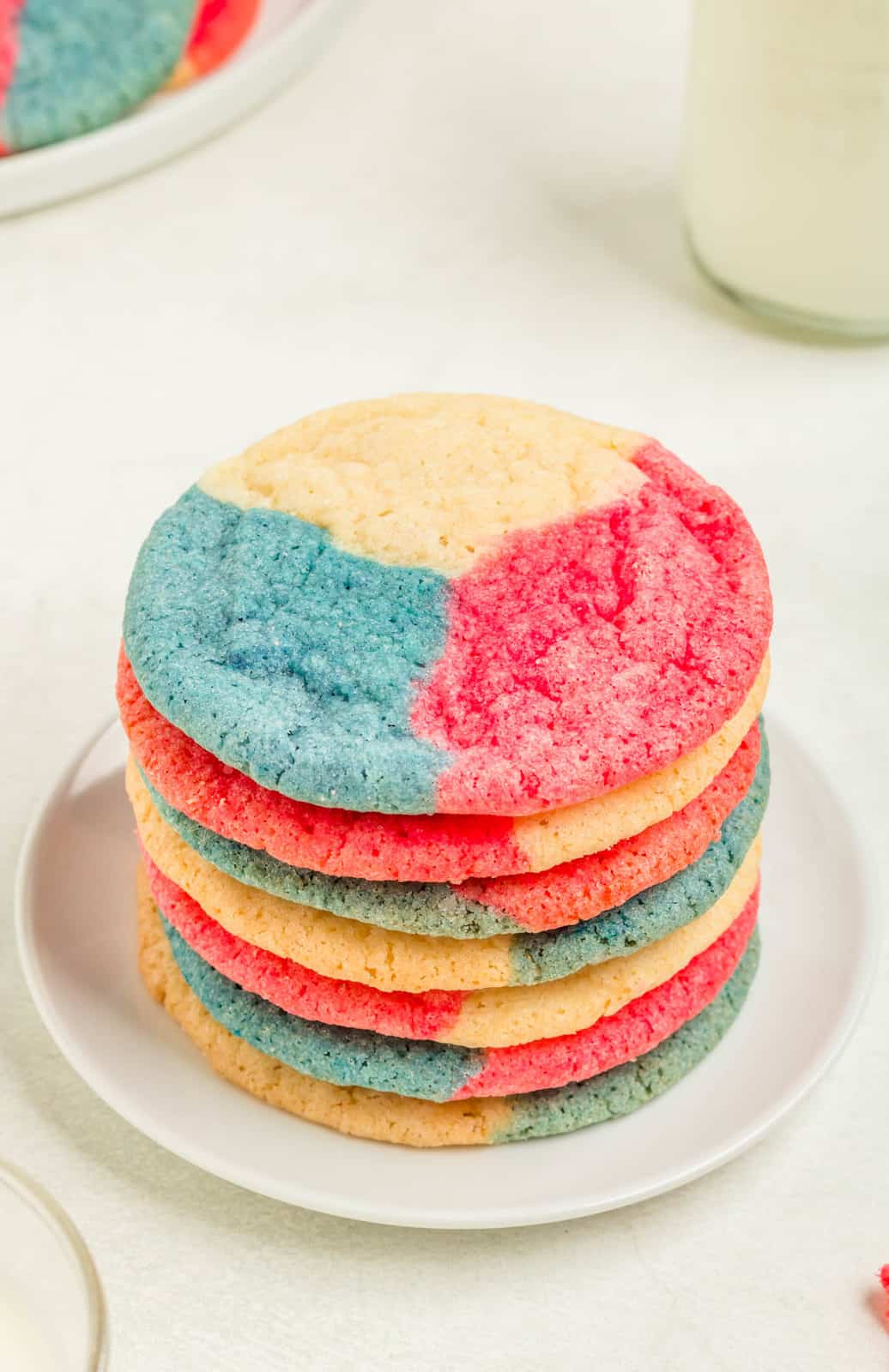 Red White & Blue Cookies stacked on white plate.