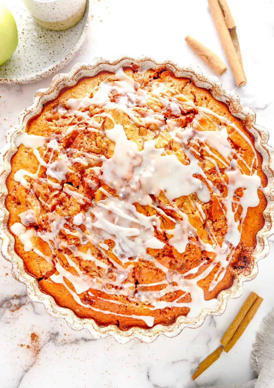 Overhead image of finished Apple Cinnamon Cake in baking pan.