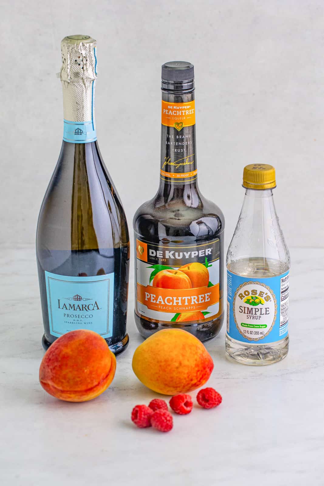 Ingredients needed to make a Peach Bellini.