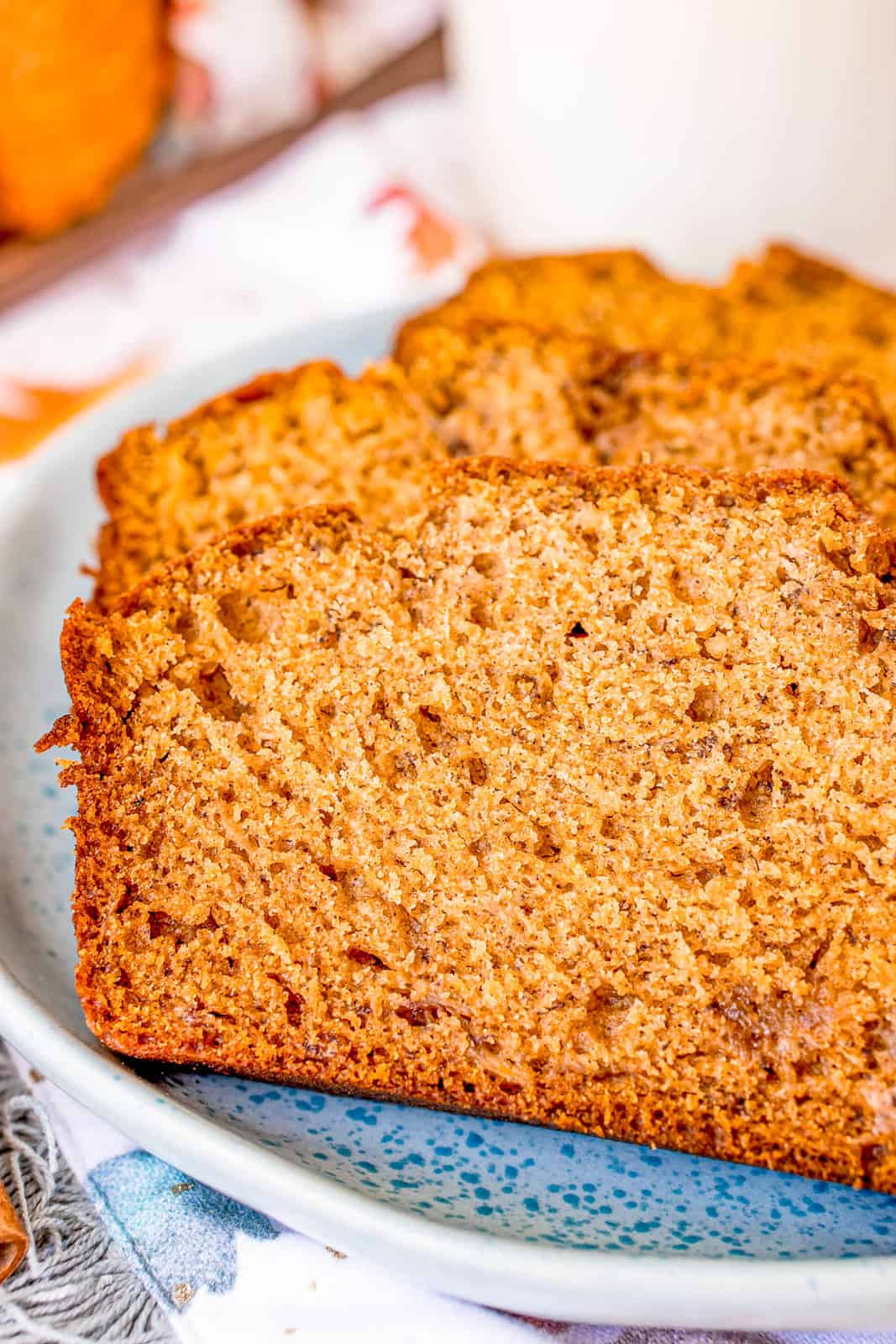 Close up of slice of Pumpkin Banana Bread on plate.