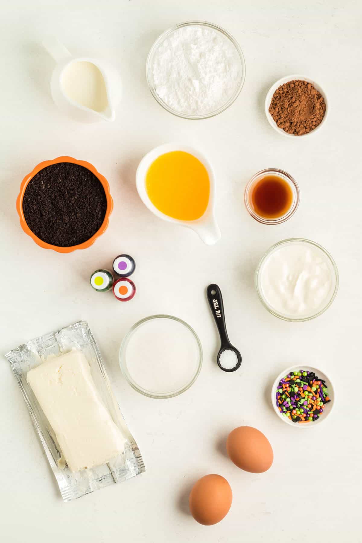 Ingredients needed to make Mini Halloween Cheesecakes.