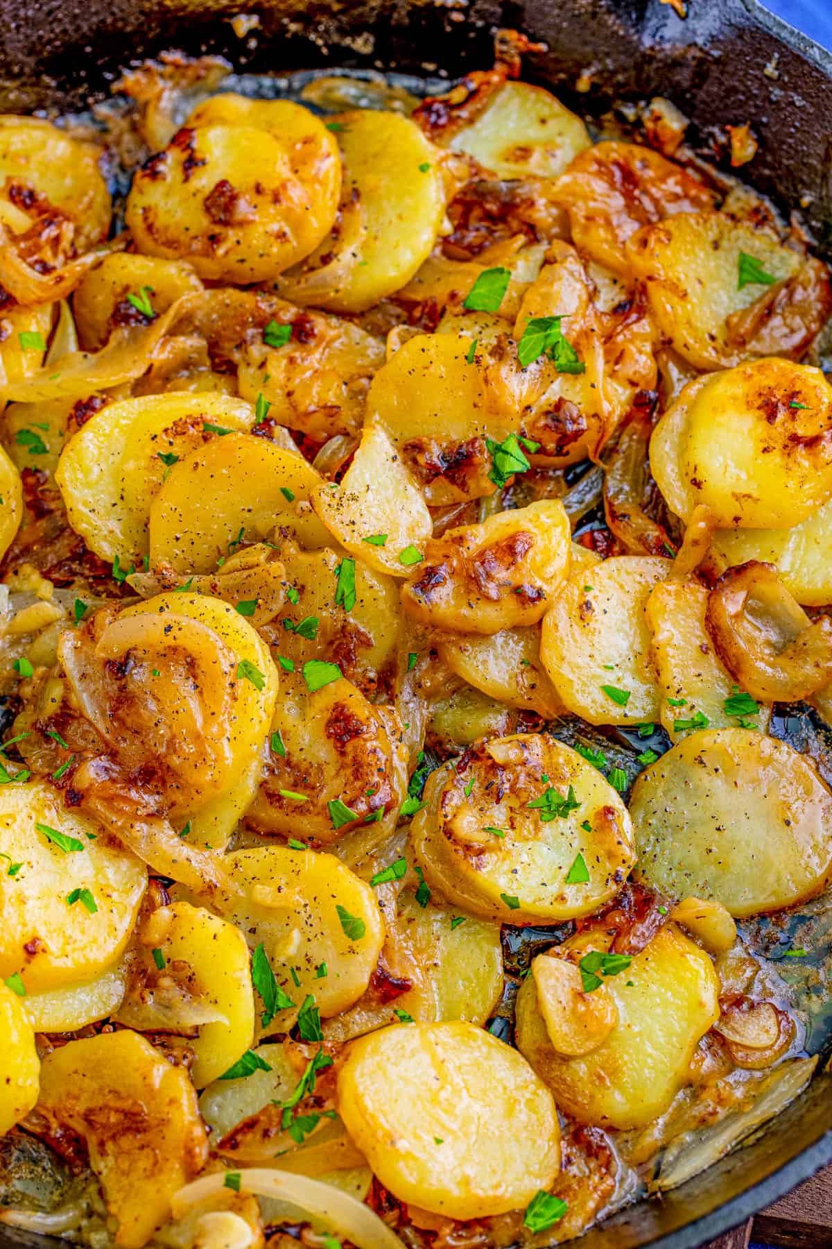 Finished Smothered Potatoes in skillet.