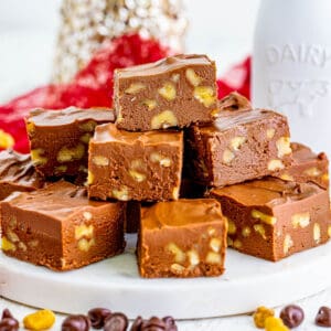 Close up square photo of stacked fudge.