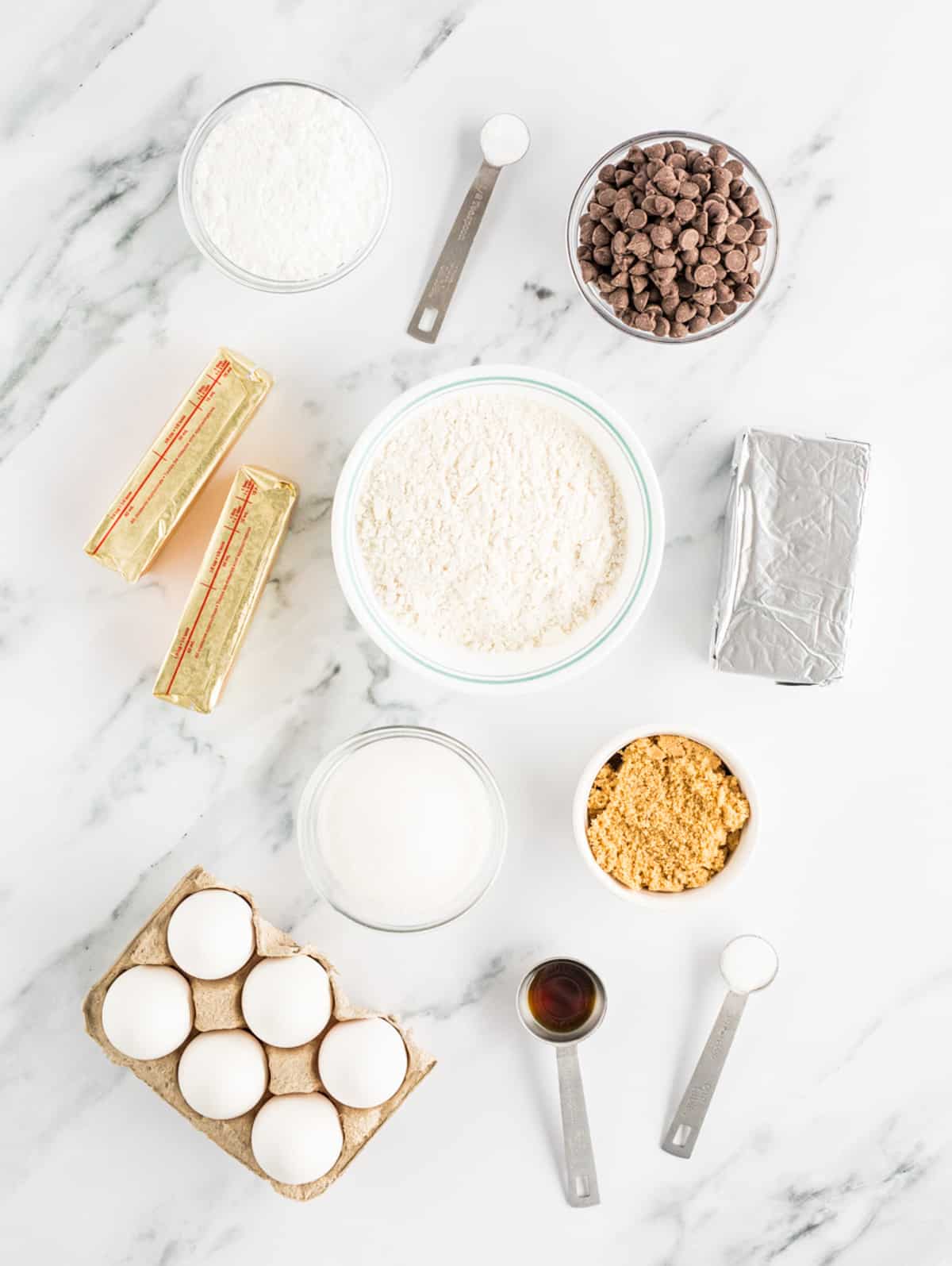 Ingredients needed to make Cheesecake Stuffed Chocolate Chip Cookies.