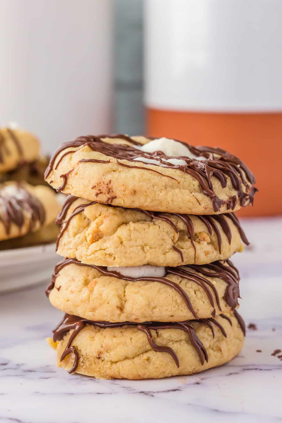 Four stacked S'mores Cookies on top of one another.