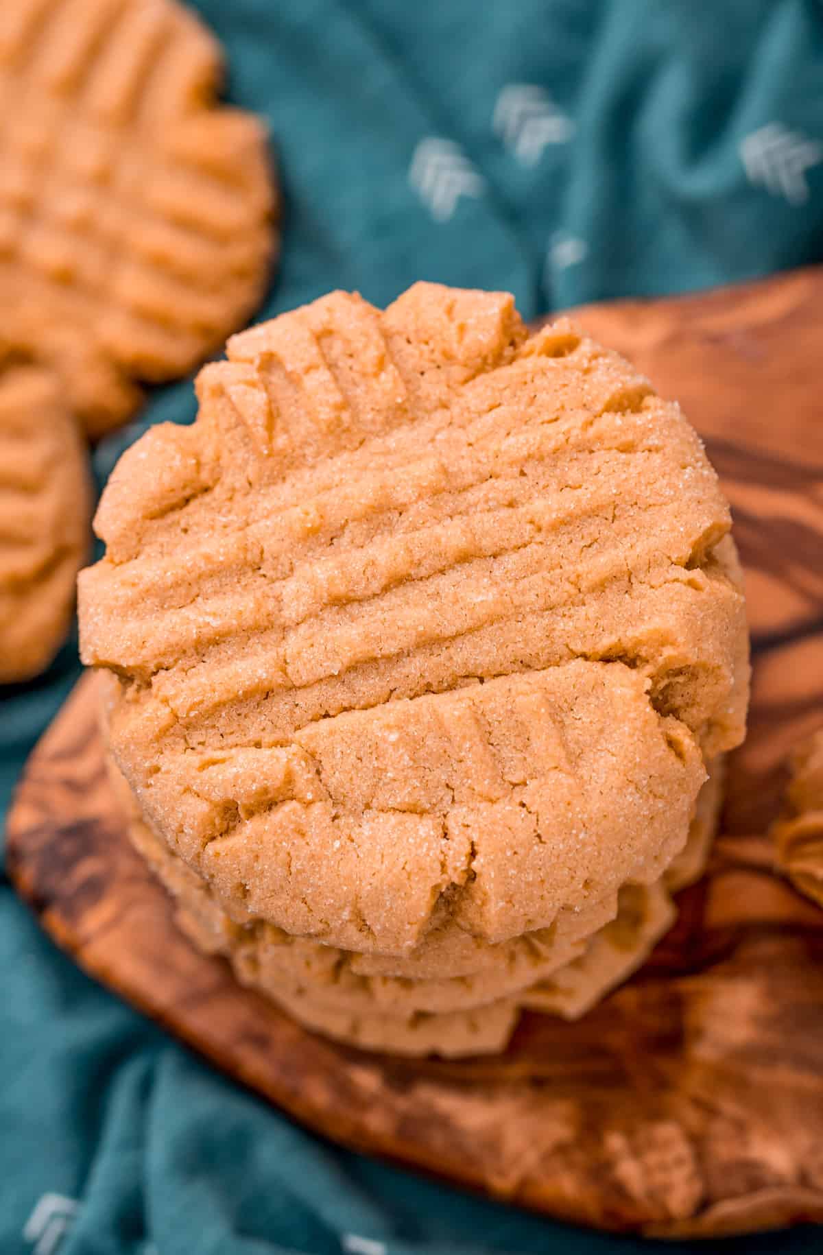 Overhead of stacked cookies showing the criss cross pattern from fork.
