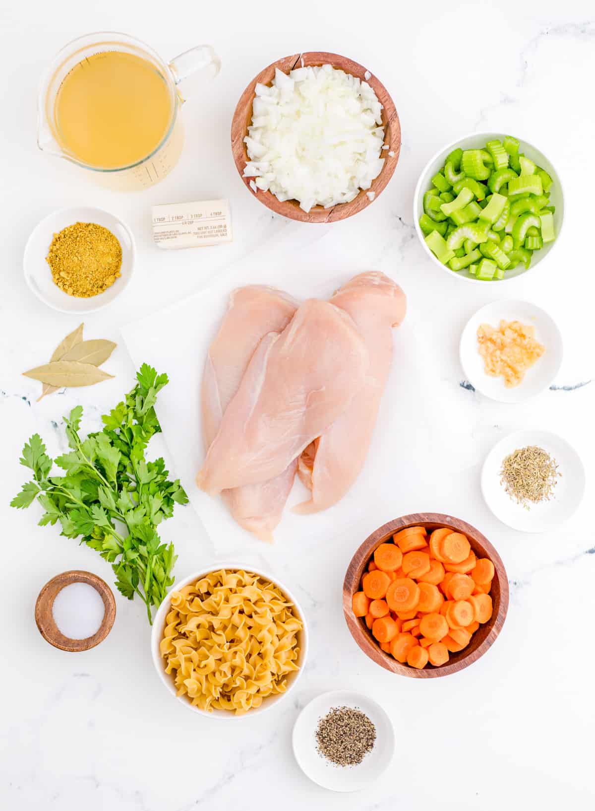 Ingredients needed to make Instant Pot Chicken Noodle Soup.