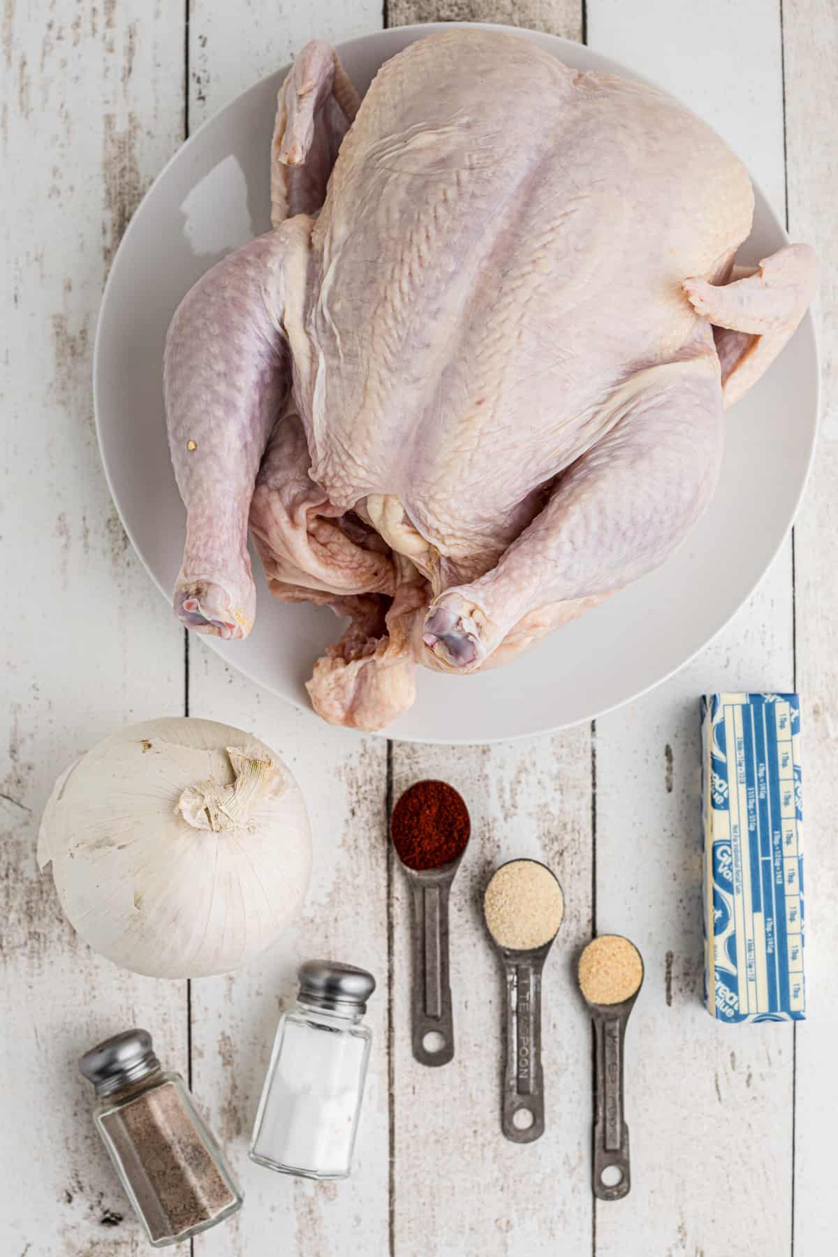 Ingredients needed to make a Whole Roasted Chicken.