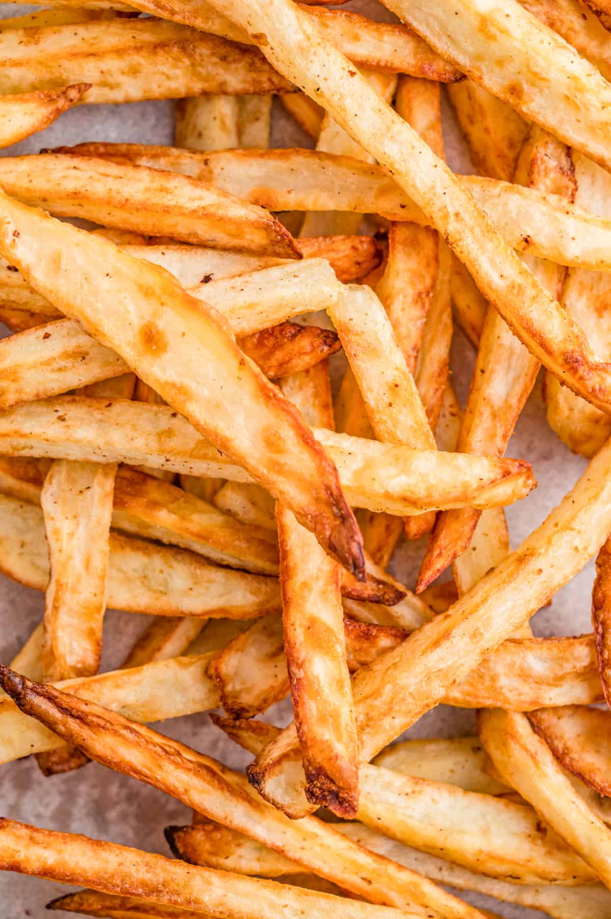 Close up of Air Fryer French Fries showing the golden brown from cooking.