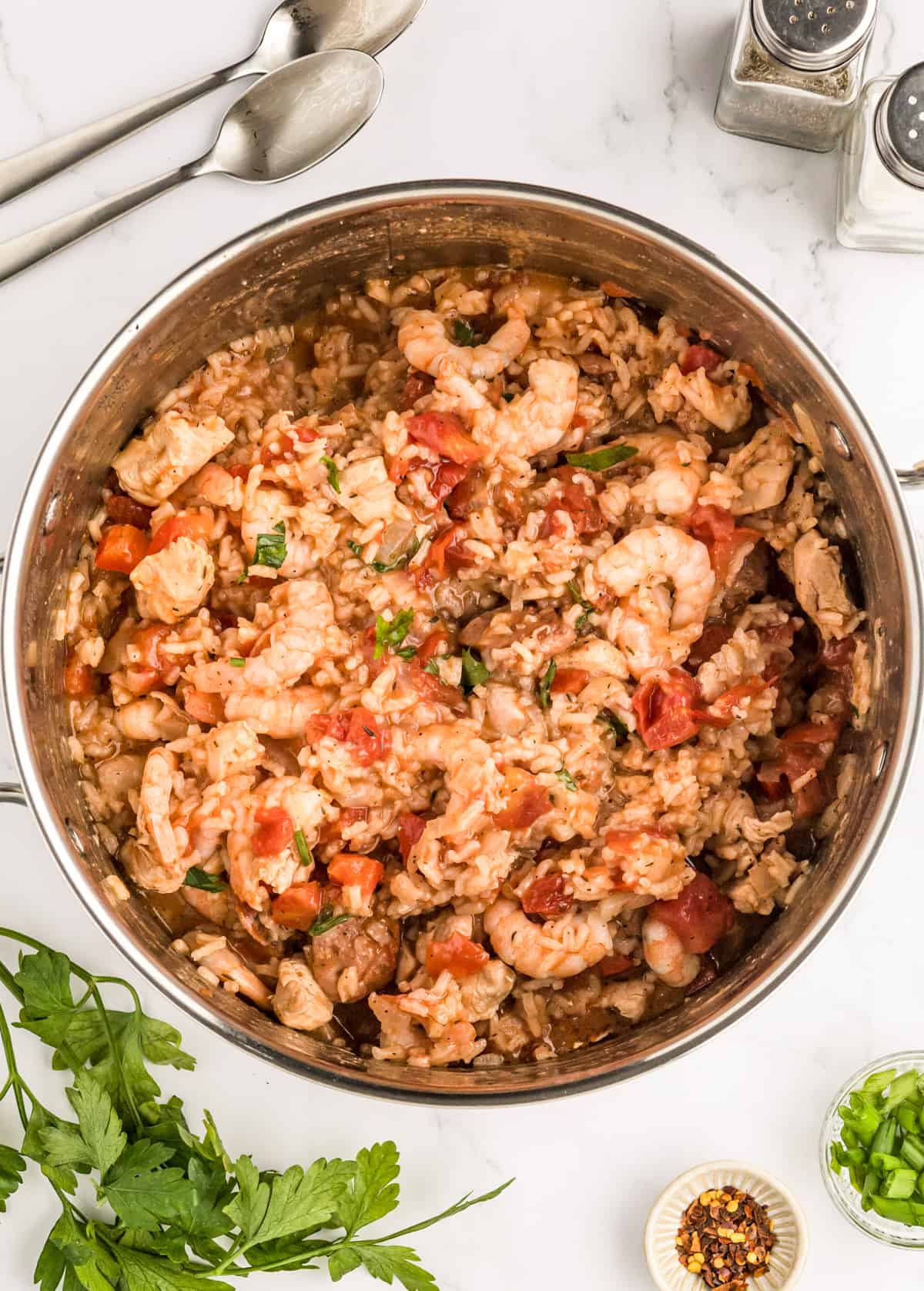 Overhead of Easy Jambalaya Recipe in pot garnished with parsley.