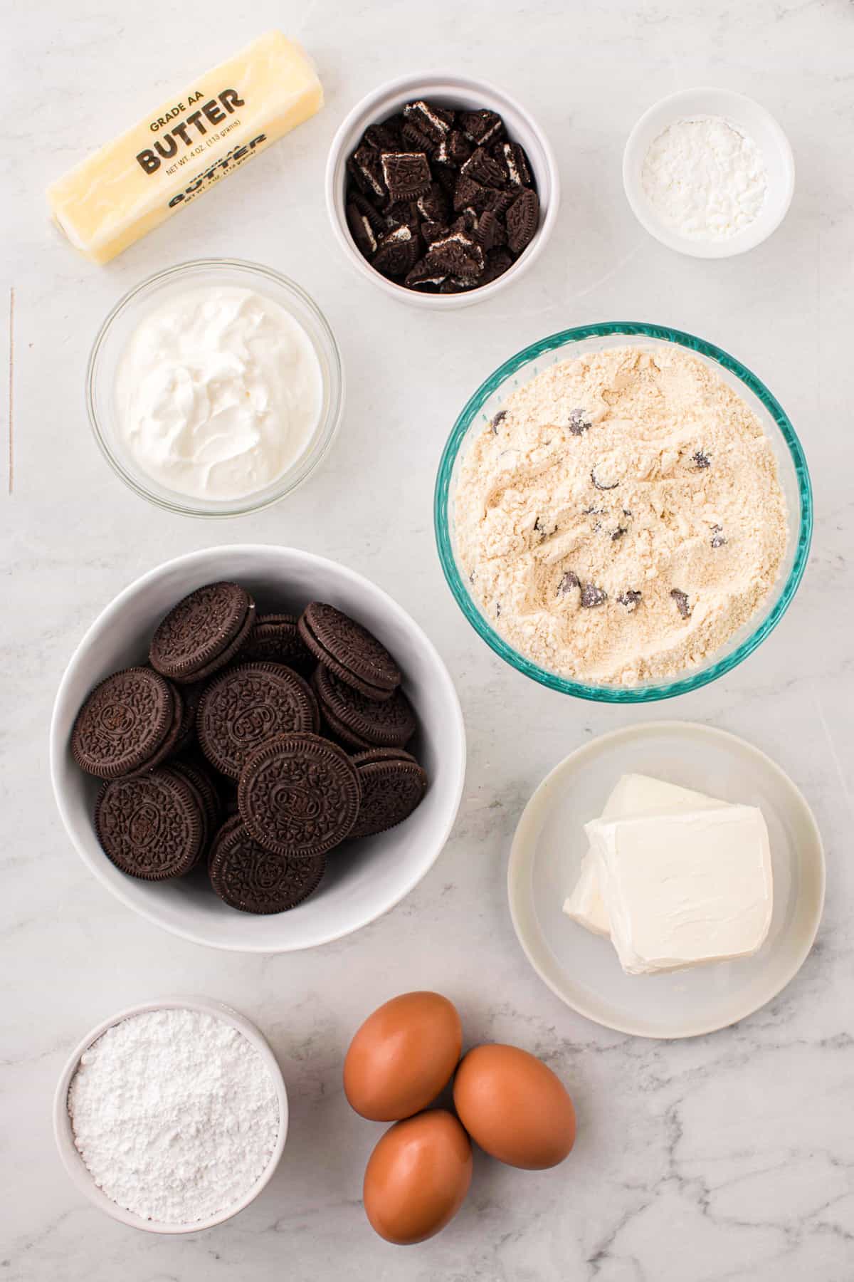 Ingredients needed to make Slutty Cheesecake Bars.