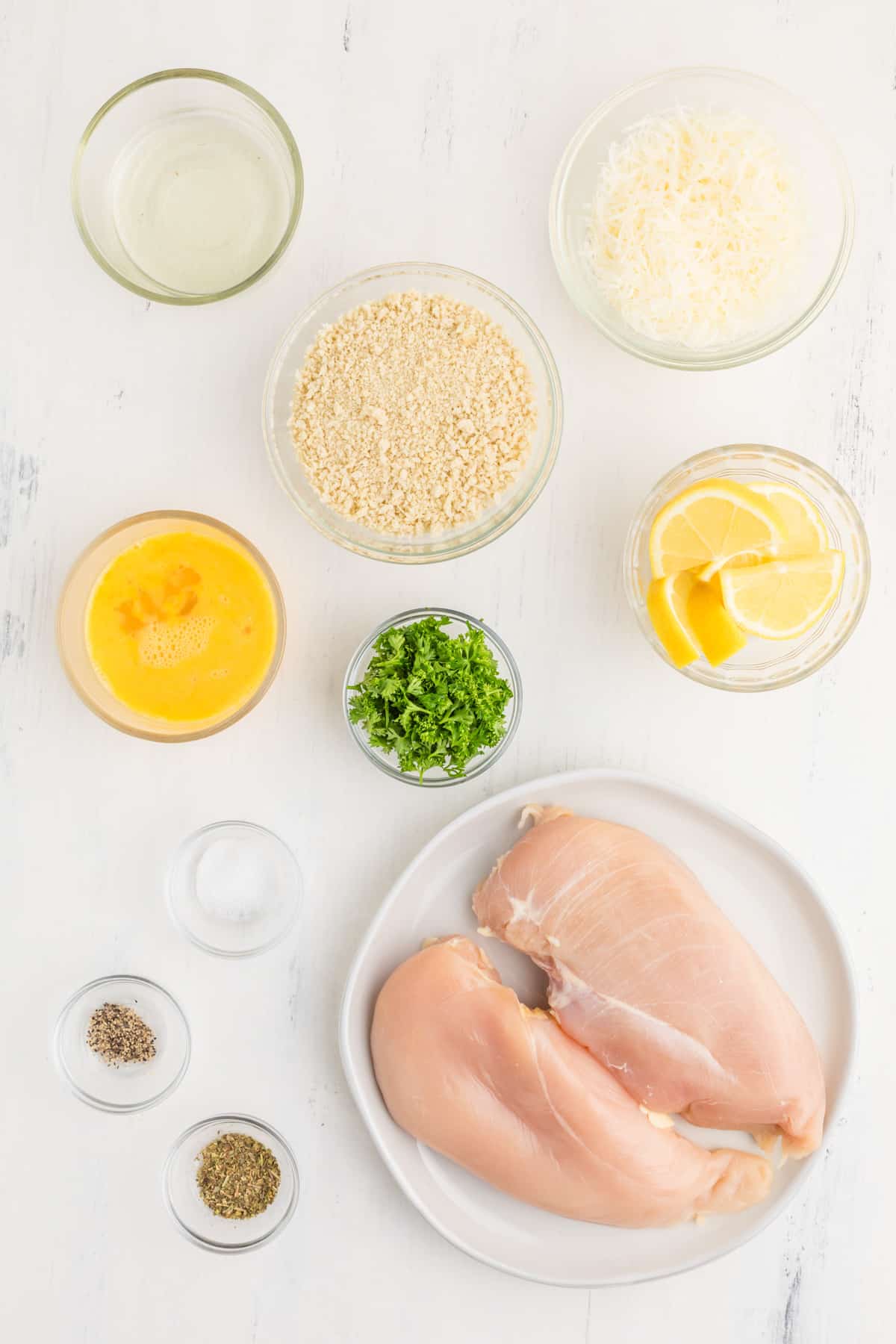Step by step photos on how to make Parmesan Crusted Chicken.