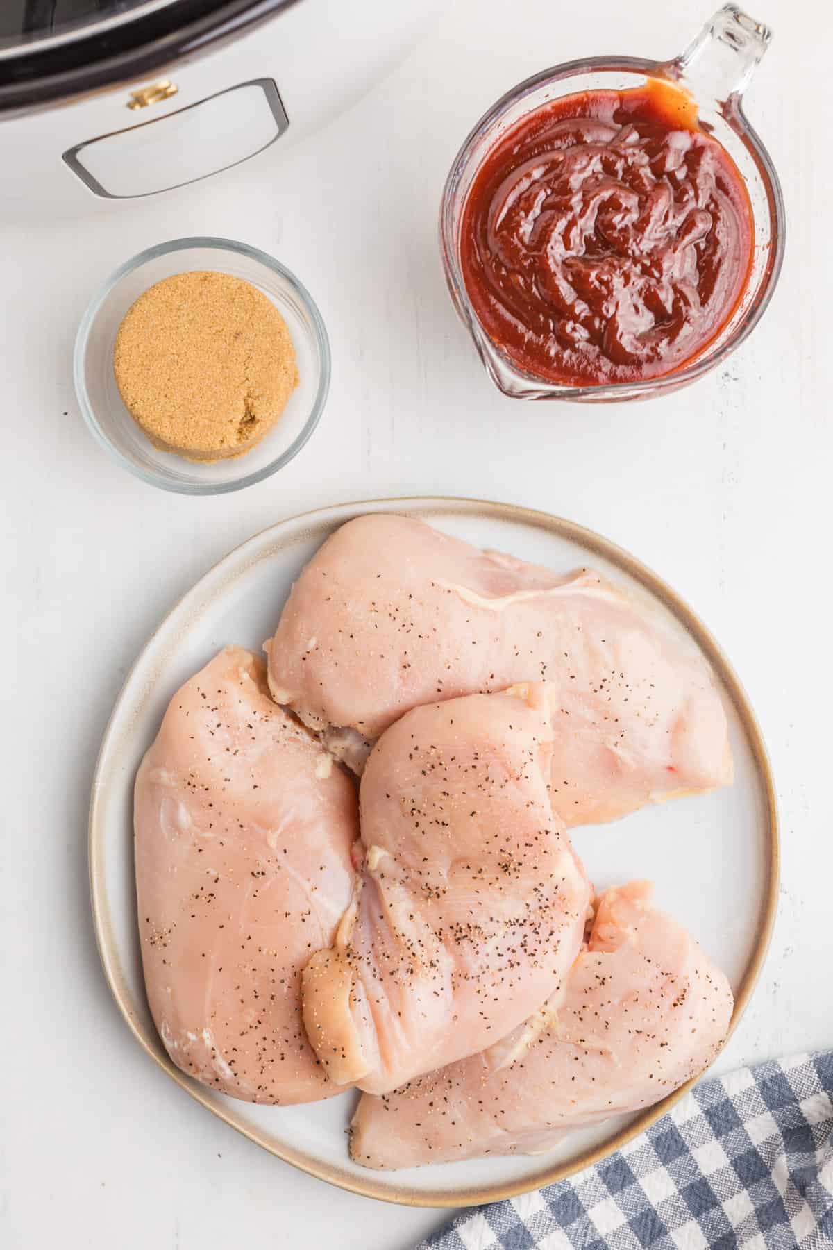 Ingredients needed to make Slow Cooker BBQ Chicken.