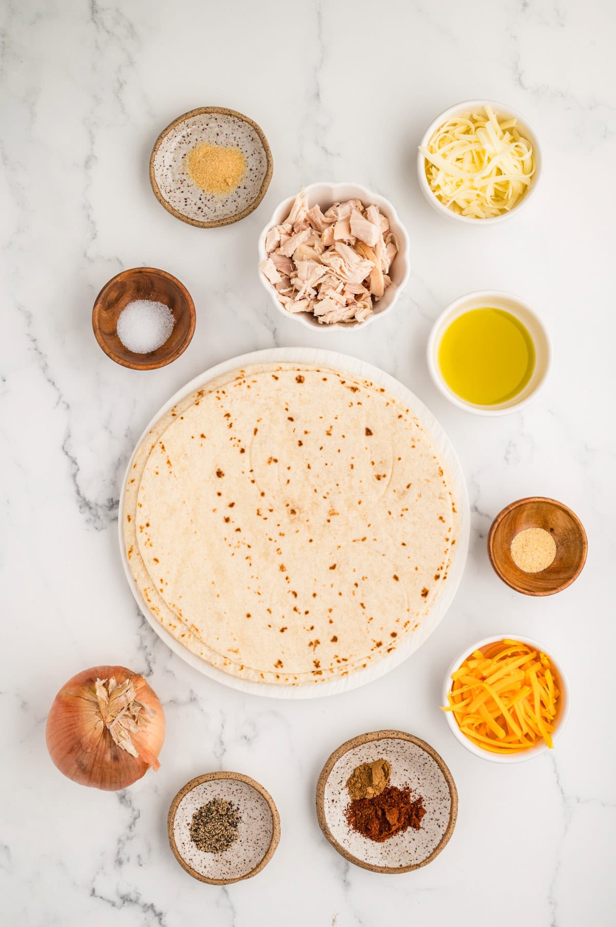 Ingredients needed to make a Chicken Quesadilla Recipe.