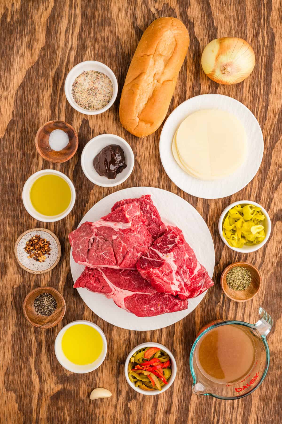 Ingredients needed to make Italian Beef Sandwiches.