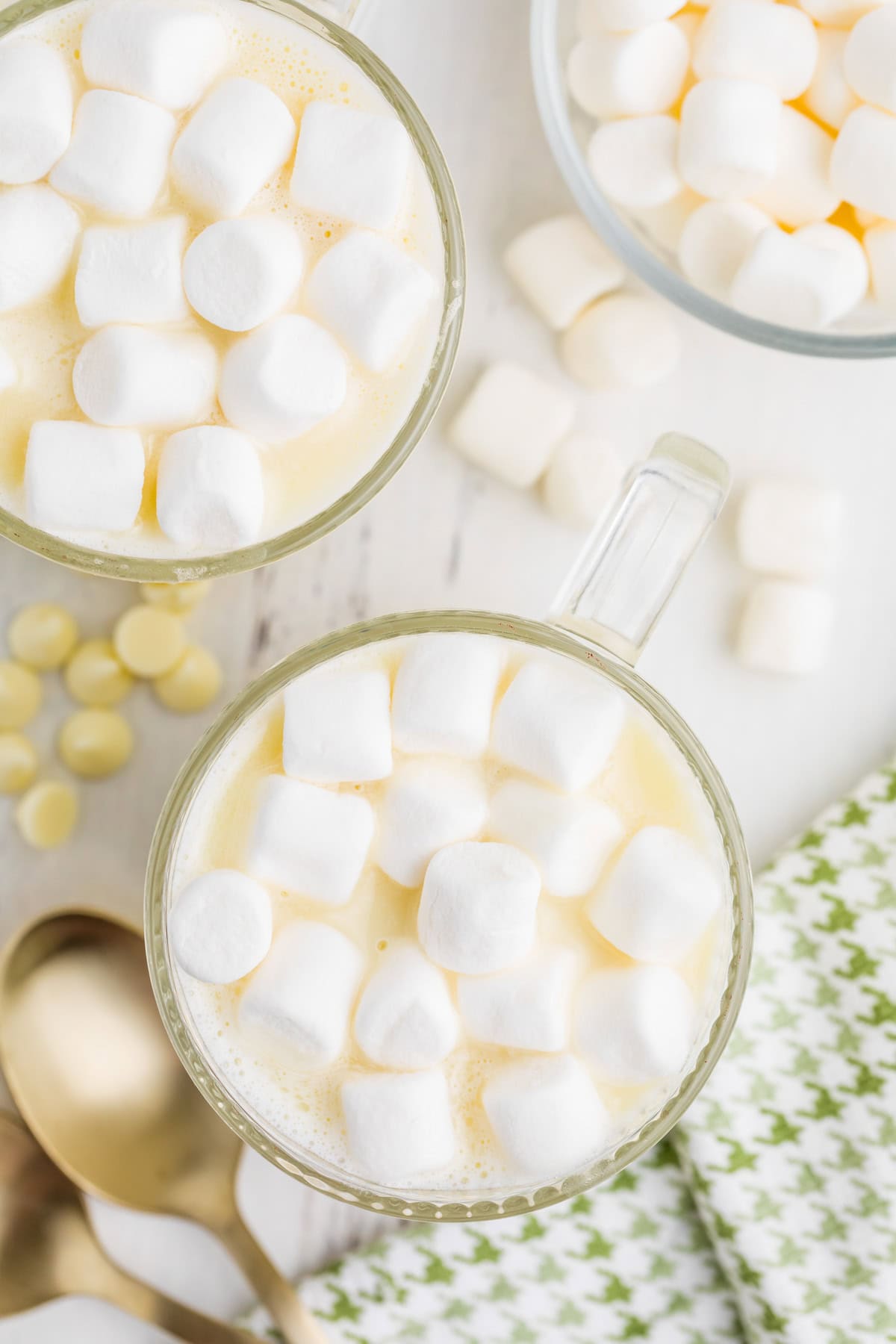 Overhead of Easy White Hot Chocolate in glasses topped with marshmallows.