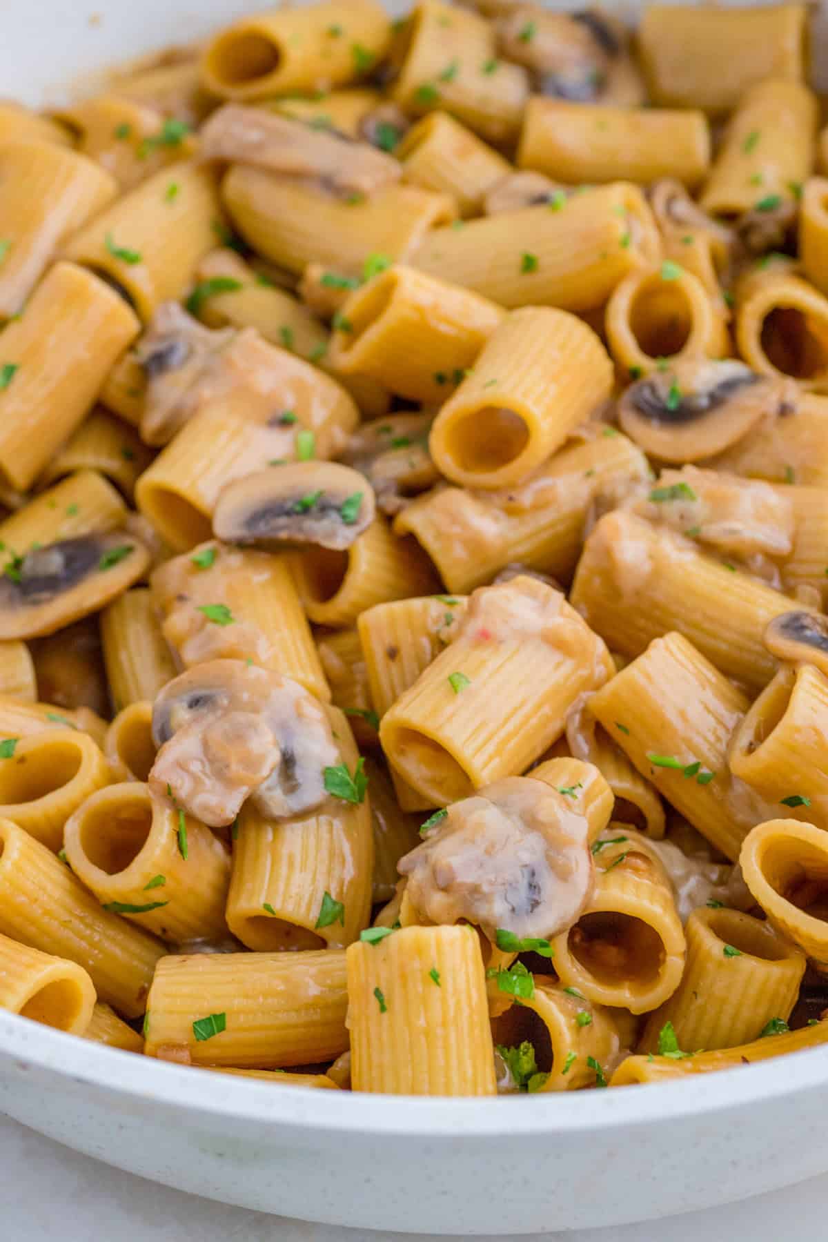 French Onion Pasta in pan all mixed together showing ingredients.