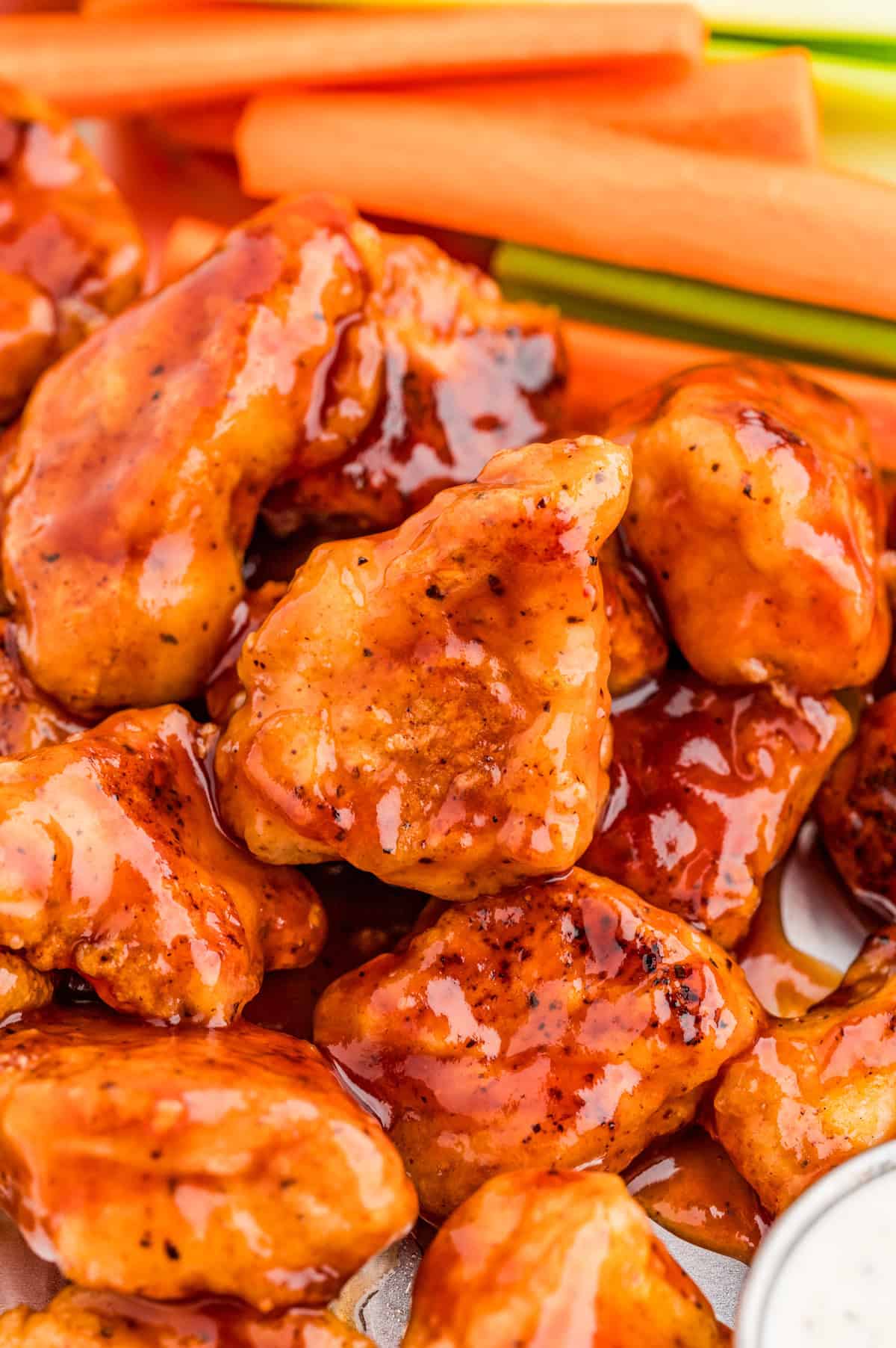 Close up of the chicken showing them coated in the bbq sauce.