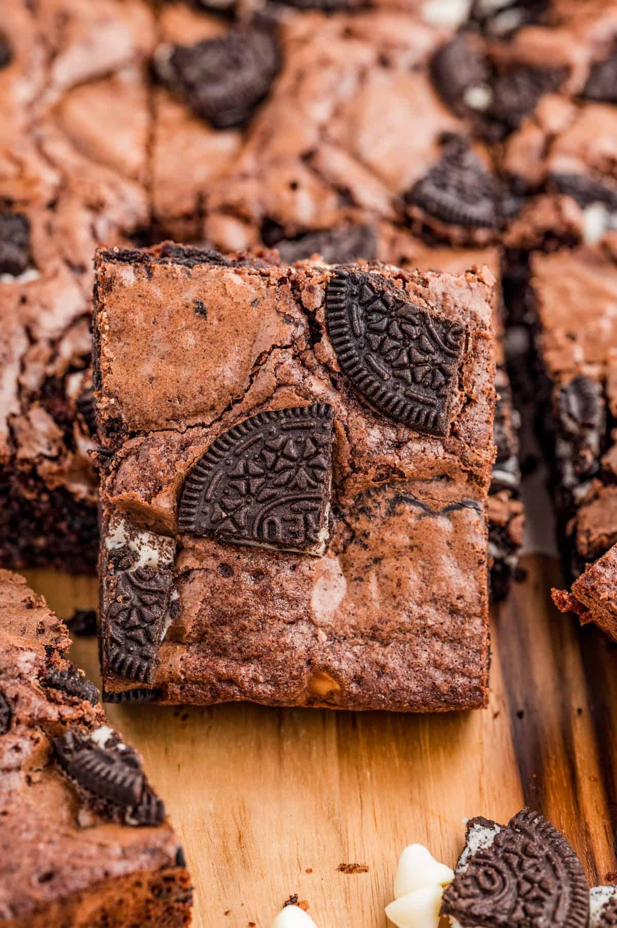 Oreo Brownies with one brownie layered against other brownies.