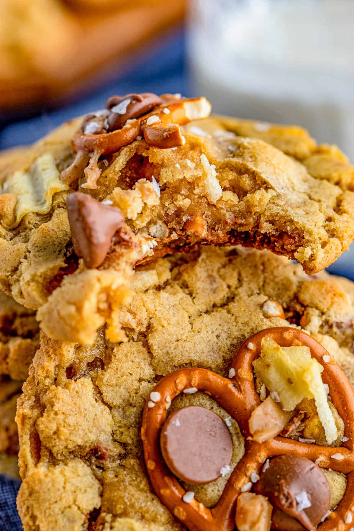 Stacked cookies with bite taken out of one cookie.