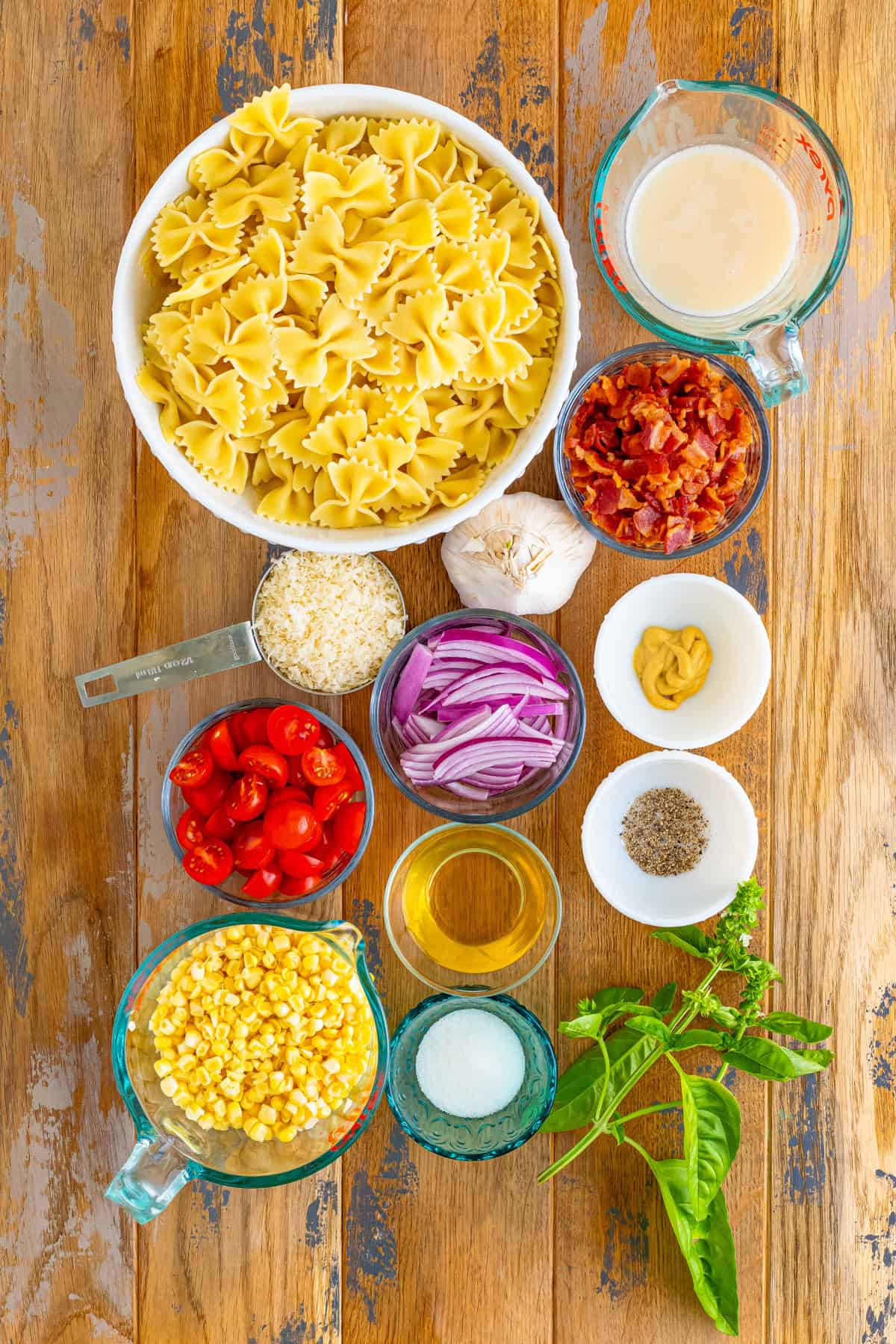 Ingredients needed to make Bacon and Corn Pasta Salad.