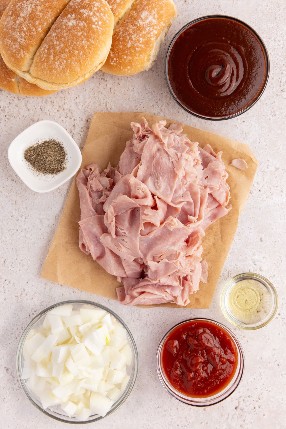 Ingredients needed to make a BBQ Chipped Ham Sandwich.