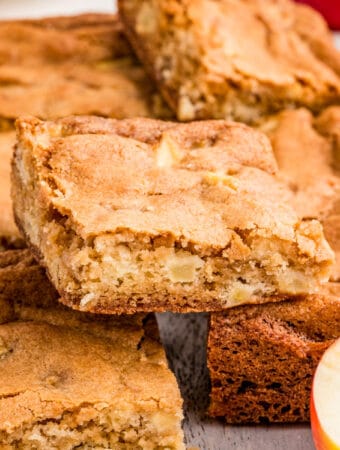 Close up square image of stacked blondies.