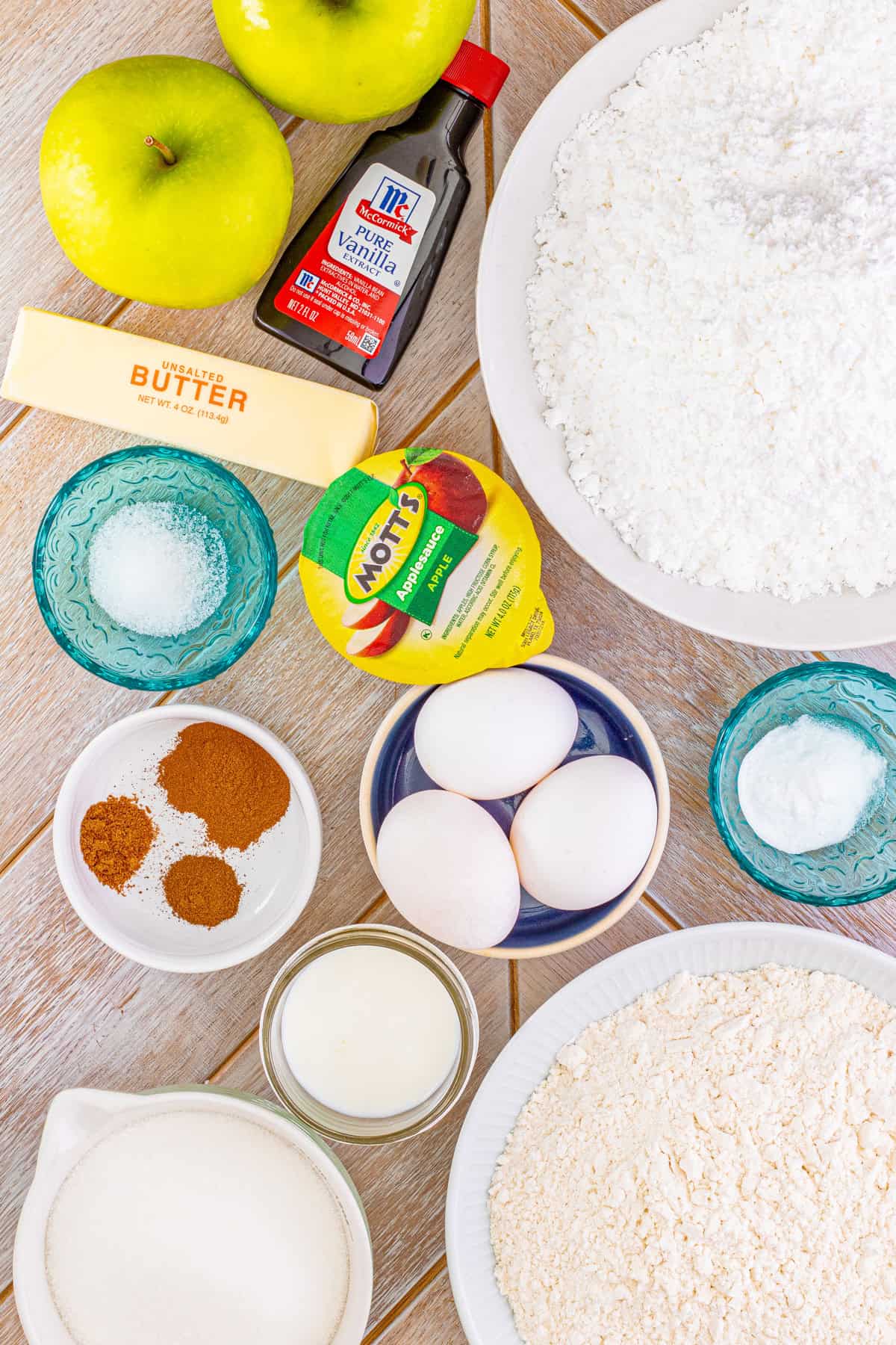 Ingredients needed to make an Apple Cake with Cinnamon Buttercream Frosting.